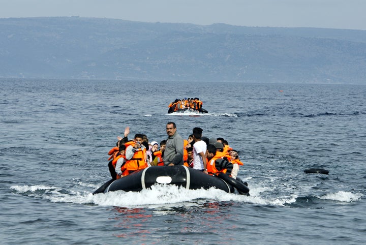 Refugees, hoping to cross into Europe, arrive at the shore of Lesbos Island, Greece, on Nov. 24, 2015. Over 3,500 refugees and migrants have died or gone missing crossing the Mediterranean this year.