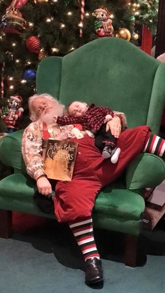 Baby Zeke is seen passed out with Santa Claus during a heartwarming photoshoot at an Indiana mall.