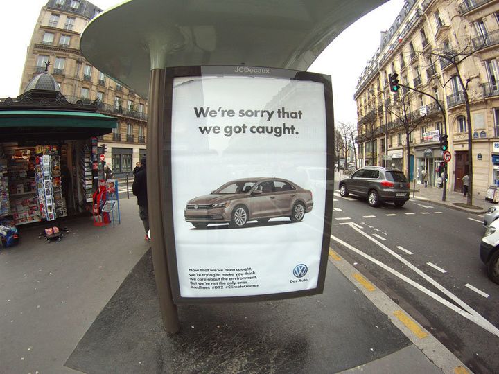 Art collective Brandalism put up street art in Paris protesting corporate sponsorship of the U.N. climate talks.
