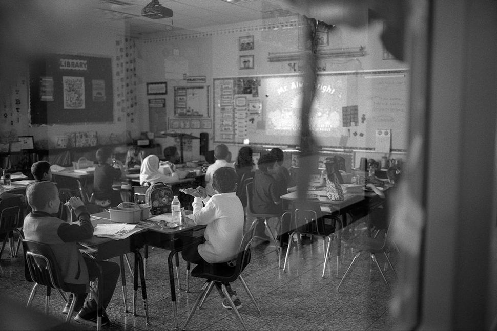 Children at Lunch Watching the cartoon “Arthur,” Mercy School, Edmond, OK 2015