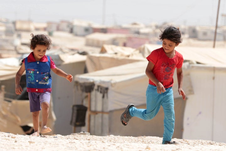 Young Syrian refugees play at the U.N.-run Zaatari camp, north-east of the Jordanian capital Amman, on Sept. 19, 2015.