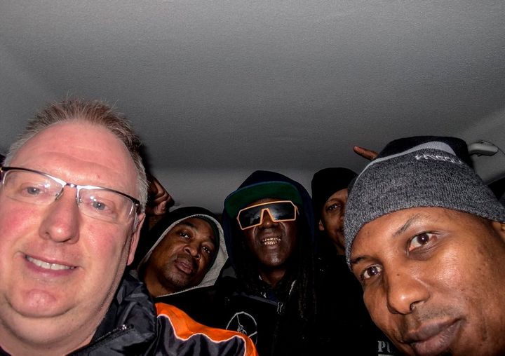 Kevin Wells is seen driving members of Pubic Enemy to their gig in Sheffield, England, on Saturday after their taxi bailed on them.