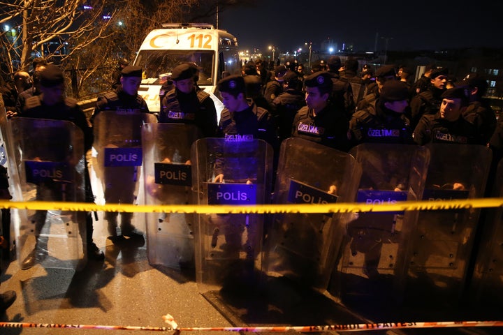 Turkish police officers stand guard around Bayrampasa Metro Station after a blast on Dec 1.