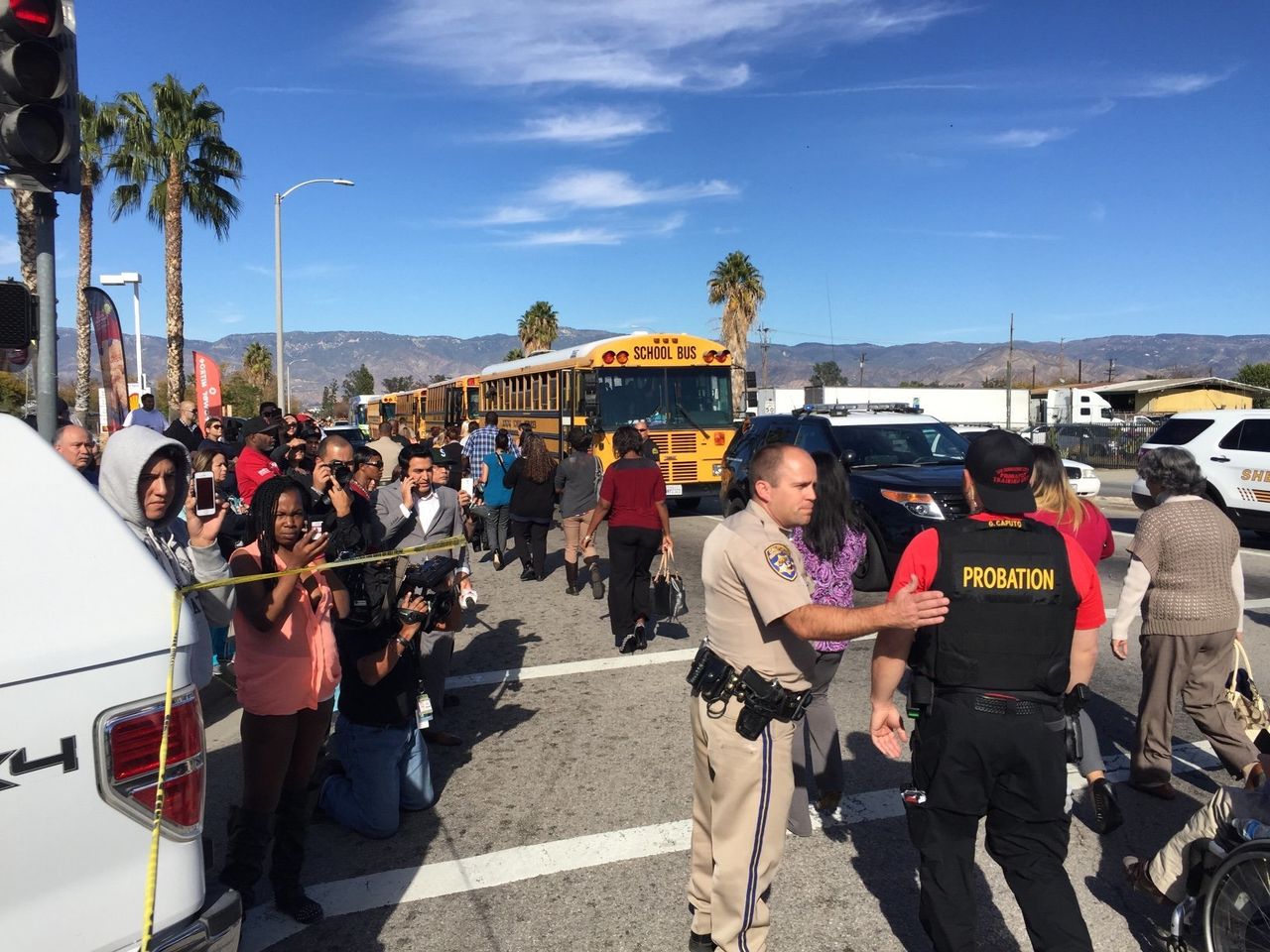 People are evacuated from the shooting scene in San Bernardino, California, on Dec. 2, 2015.