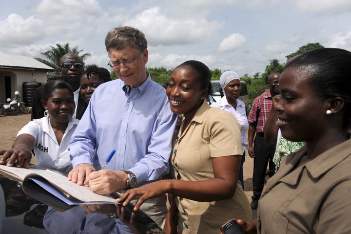 Microsoft's chairman Bill Gates, one of world's richest man and high profile aid donors, signs visitor's register at the Ahentia Health Centre in the Awutu Senya district, central region in Ghana on March 26, 2013. Bill Gates is in Ghana to meet with government and health officials on ways to combat global health problems. Bill Gates Foundation donates at least five percent of its asset each year to fight Polio Myelitis, HIV/AIDS, Tuberculosis, Malaria and other global infectious diseases across the globe.