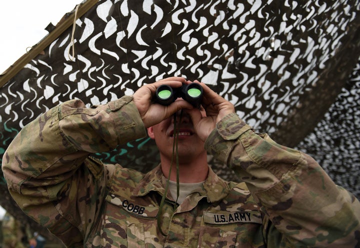 An American soldier at Forward Operating Base Connelly, where U.S. troops are providing training and tactical advic