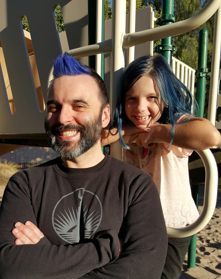 Ryan Myers poses with his daughter, Lilith.