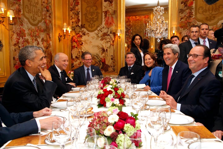 President Barack Obama (L) and French President Francois Hollande (R) with Secretary of State John Kerry (2nd R), French Minister for Ecology, Sustainable Development and Energy, Segolene Royal, (3rd R) and French Foreign Minister Laurent Fabius (2nd L) in Paris Nov. 30.