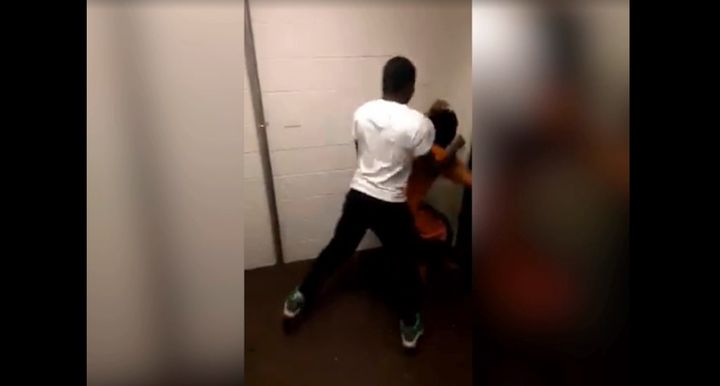 One of the two men is seen punching the 23-year-old victim, who has cerebral palsy, a neurological disorder which affects body movement and muscle coordination.