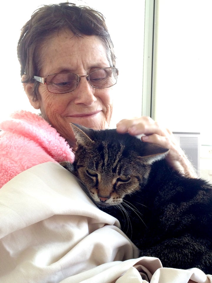 Grace Campbell with her tabby, Cuddles.