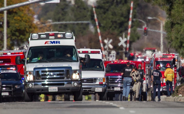 SAN BERNARDINO, CA - DECEMBER 2: Ambulances leave the scene of a mass shooting at the Inland Regional Center on December 2, 2105 in San Bernardino, California. Multiple fatalities and injuries were reported as police search for up to three suspects who are still at-large.