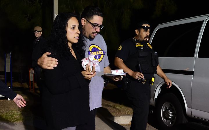 Omar Riopedre embraces his wife Diana, who was inside the Inland Regional Center when the mass shooting took place on Dec. 2, 2015.