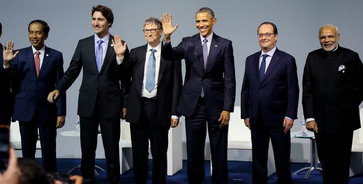 President of Indonesia Joko Widodo, Canadian Prime Minister Justin Trudeau, Microsoft CEO Bill Gates, US President Barack Obama, French President Francois Hollande and Indian Prime Minister Narendra Modi pose for a family photo during the 'Mission Innovation - Accelerating the Clean Energy Revolution' meeting on the opening day of the World Climate Change Conference 2015 (COP21) at Le Bourget, near Paris, on November 30, 2015. A HuffPost/YouGov survey finds most Americans want to see their country lead the way on fighting climate change.