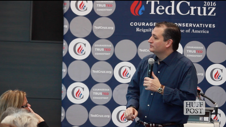 Sen. Ted Cruz (R-Texas) answers questions from the crowd during a town hall event at Kirkwood Community College in Coralville, Iowa, on Nov. 30.