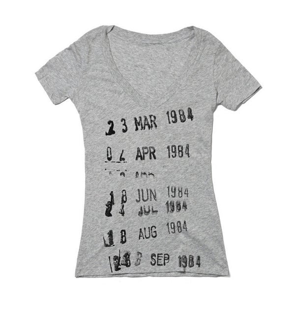 Get the <a href="http://www.outofprintclothing.com/collections/womens-best-sellers/products/library-stamp-womens-tee">Library