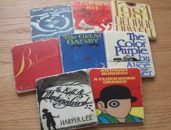 Get the <a href="https://www.etsy.com/listing/254177568/set-of-4-tumbled-marble-tile-coasters">book cover coasters</a>.