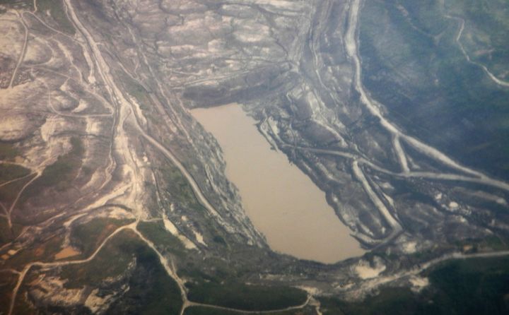 A November 2013 aerial view of coal mining in the Indonesian province of East Kalimantan, where a coal rush drew international mining concerns and threatened the local capital of Samarinda.