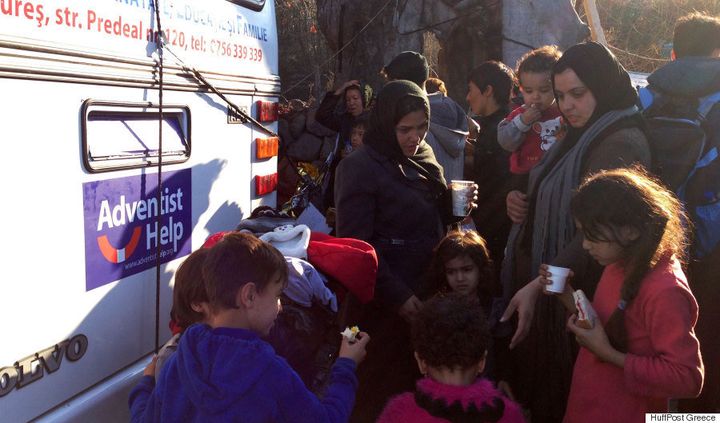 Volunteers help refugees in Greece.