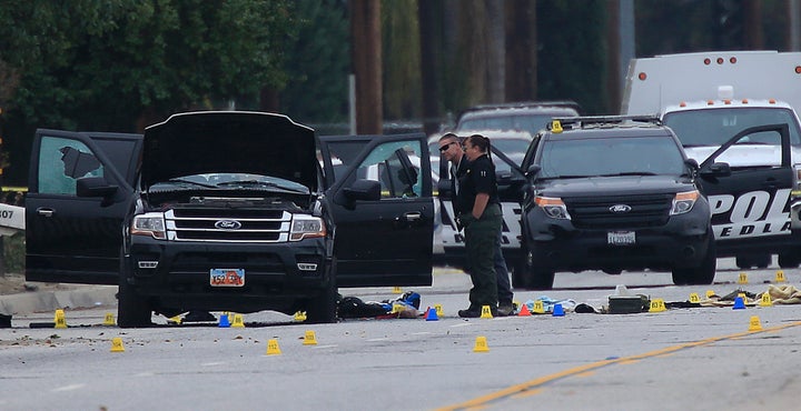Crime Scene Investigators search the suspected assailants' SUV on San Bernardino Ave. December 4, 2015 in San Bernardino, Cal