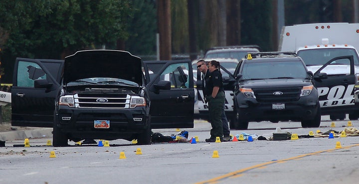 Crime Scene Investigators search the suspected assailants' SUV on San Bernardino Ave. December 4, 2015 in San Bernardino, California.