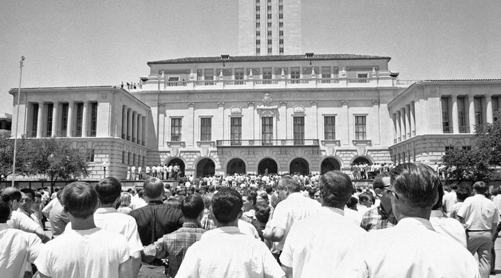 Crowds gather in front of the administration building at the University of Texas in Austin on Aug. 1, 1966, awaiting the removal of the body of Charles Joseph Whitman, 25, who killed 16 people before being gunned down by police.