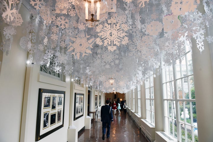 Snowflakes adorn the ceiling in a hallway at the White House on Dec. 2, 2015. 