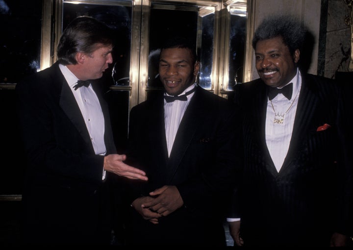 Donald Trump with boxer Mike Tyson (center) and promoter Don King at a charity gala in 1989.