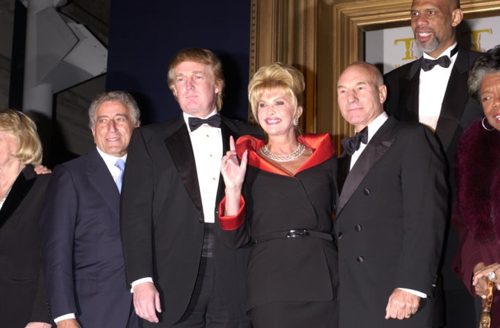 Donald Trump poses with celebrities, including Kareem Abdul-Jabbar, at an event in New York City.