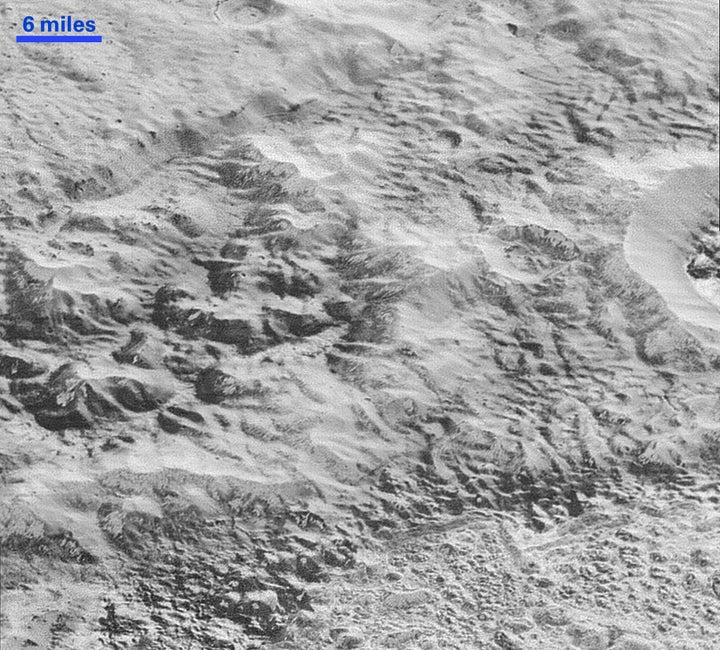 This image shows how erosion and faulting have sculpted this portion of Pluto's icy crust into rugged badlands.