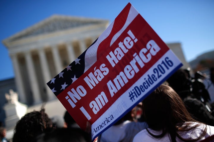 Demonstrators appeal to the Supreme Court to implement President Obama's immigration reforms.