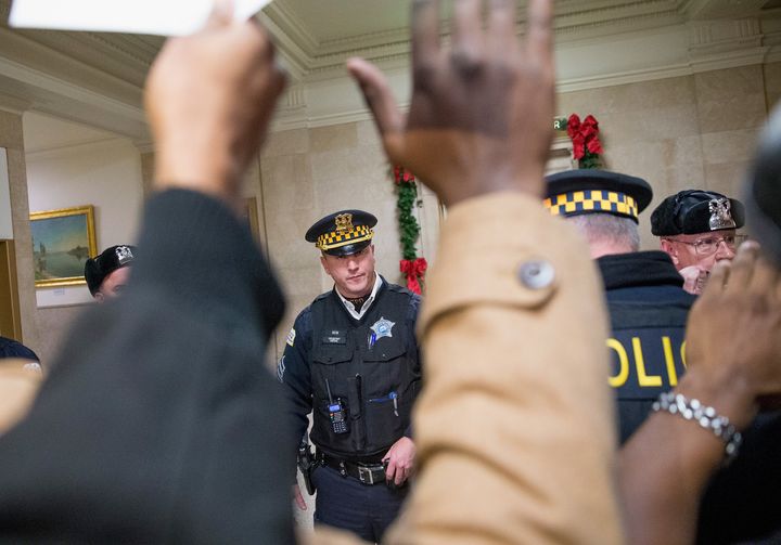 Demonstrators protest the police shooting death of Laquan McDonald in Chicago on Dec. 7, 2015.