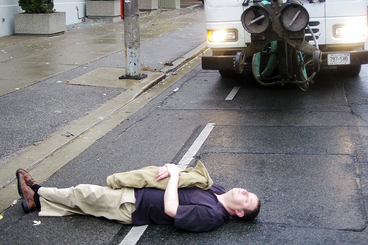 A bike activist protests against the removal of a bike lane in Toronto.