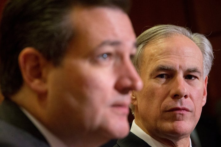 Texas Gov. Greg Abbott, right, listens to Republican presidential candidate Sen. Ted Cruz (R-Texas) speak about the resettlement of Syrian refugees in the U.S.