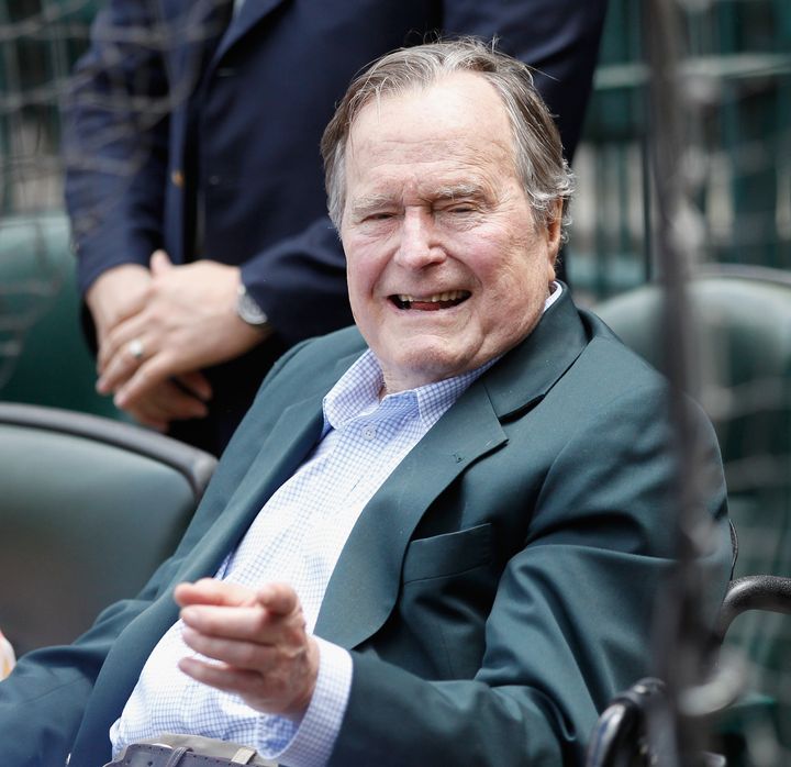 Former President George H.W. Bush watches as the Seattle Mariners play his hometown Houston Astros at Minute Maid Park on May 3, 2015, in Houston.