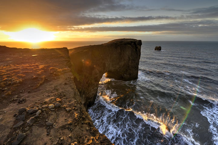 A stop on the Ring Road Trip takes you through black sand dessert to the volcanic sea cliffs of Dyrhólaey.