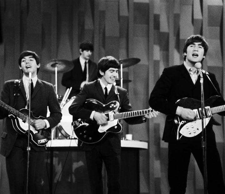 John Lennon, right, pictured singing with The Beatles on "The Ed Sullivan Show" in 1964, sang his "penis" ditty during one of