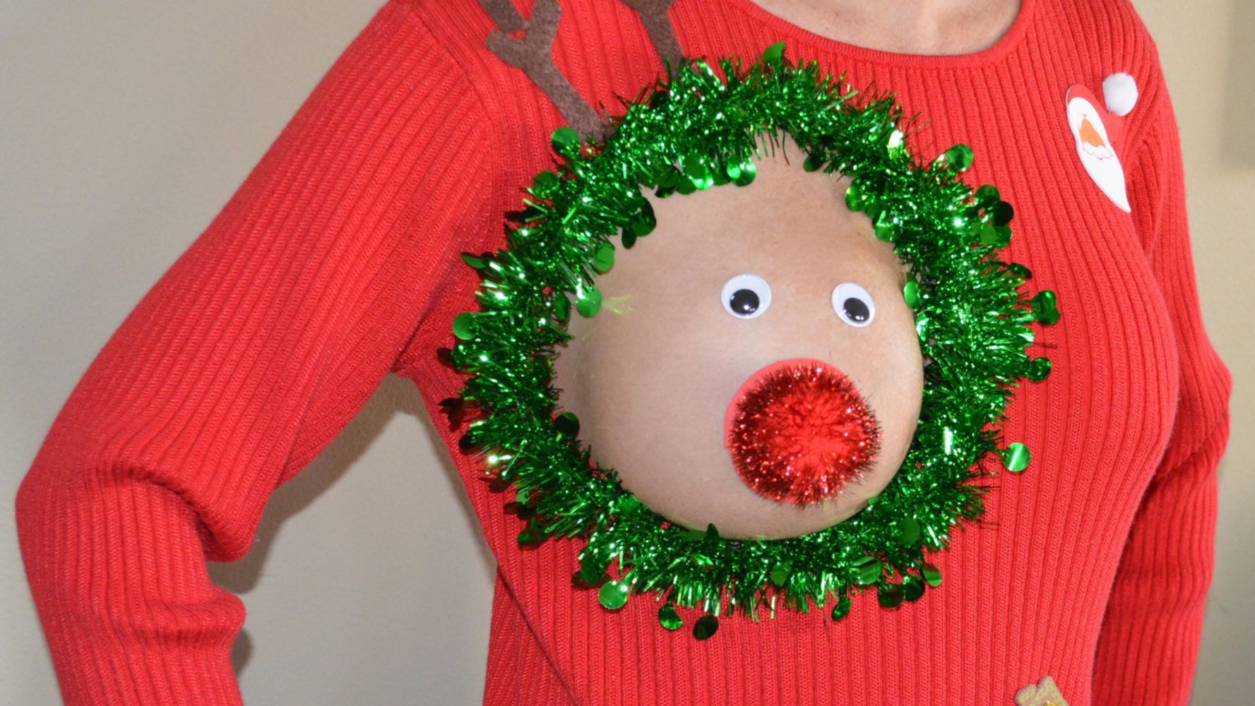 The Perfect Ugly Christmas Sweater For Breastfeeding Moms.