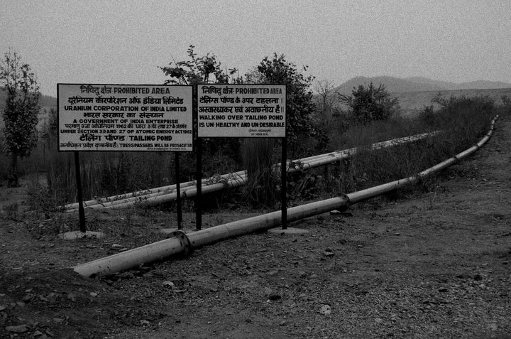UCIL erected boards warning of the factory's prohibited areas, but children still go to the dam with no idea about the health
