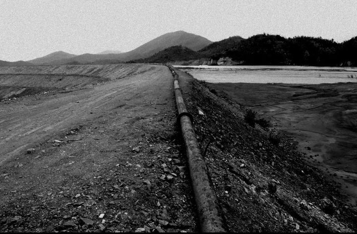A 2-mile long pipe carrying radioactive waste stretches from the UCIL processing plant to the tailing dam, which flows into the Subarnarekha River.