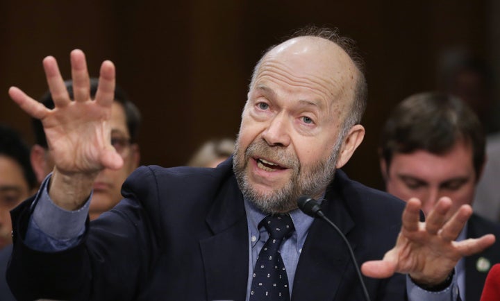 James Hansen testifies before the Senate Foreign Relations Committee during a hearing about the proposed Keystone XL pipeline project on March 13, 2014.