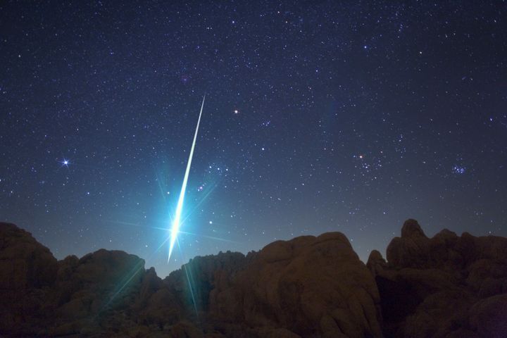 An incredible picture taken from the Mojave Desert area shows a huge meteor hurtling to earth during the annual Geminid meteor shower on Dec. 14, 2009.