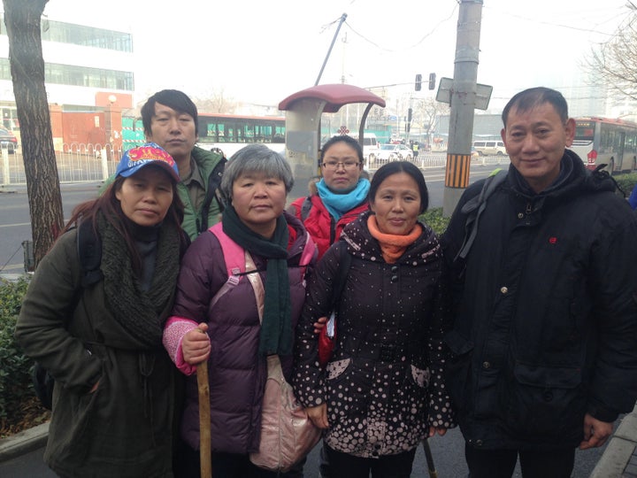 Ye Lina (second from right) and fellow supporters of Pu Zhiqiang gathered near the Beijing courthouse, where the human rights