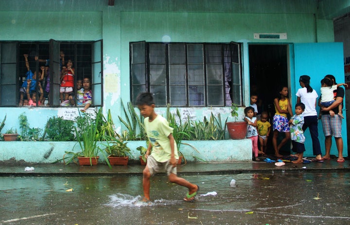 Hundreds of ferries and fishing boats were ordered to remain in port, stranding an estimated 8,000 people, after Typhoon Melor hit.