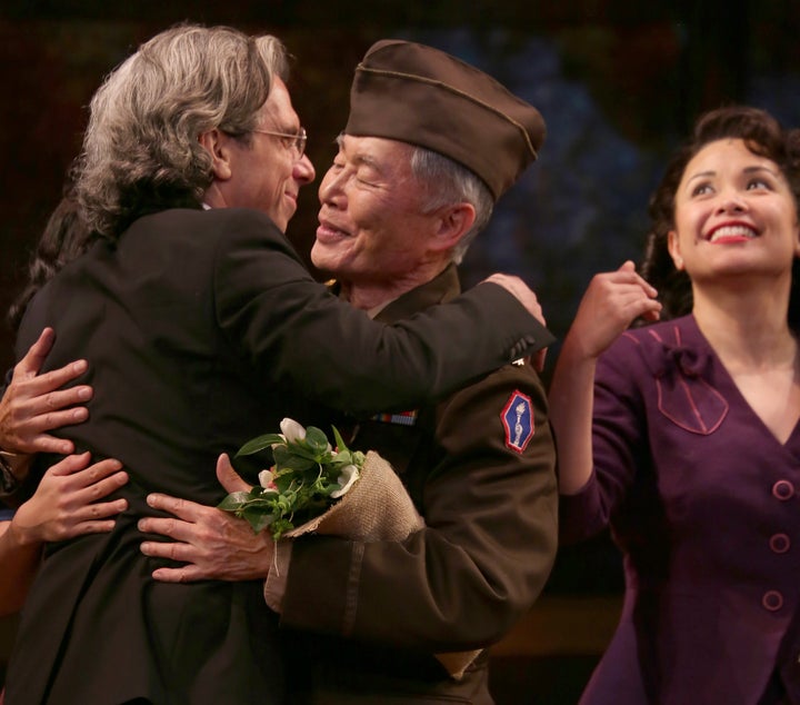 Mark Acito and George Takei share a hug after the opening night of "Allegiance." 