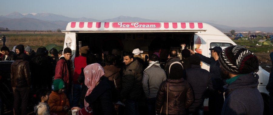 Around the camp, food stalls and cell phone merchants have seen their businesses boom.