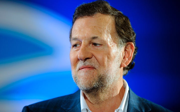 A teenager punched Spanish Prime Minister and Popular Party leader Mariano Rajoy during a campaign tour in Pontevedra, Spain,