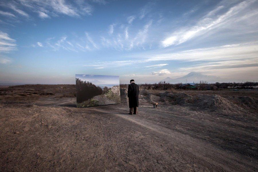 Movses Haneshyan, 105, approaches a life-size landscape of his hometown, Musa Dagh. (Photo copyright: Diana Markosian)