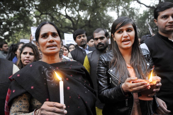 Protestors hold a candle march on the third anniversary of the attack. Releasing Jyoti Singh's identity was seen as a ch