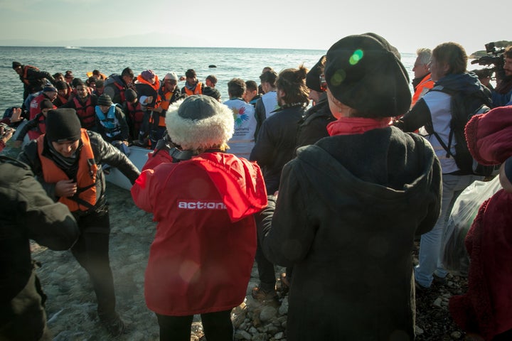 Susan Sarandon and other volunteers welcome refugees to Lesbos, Greece.