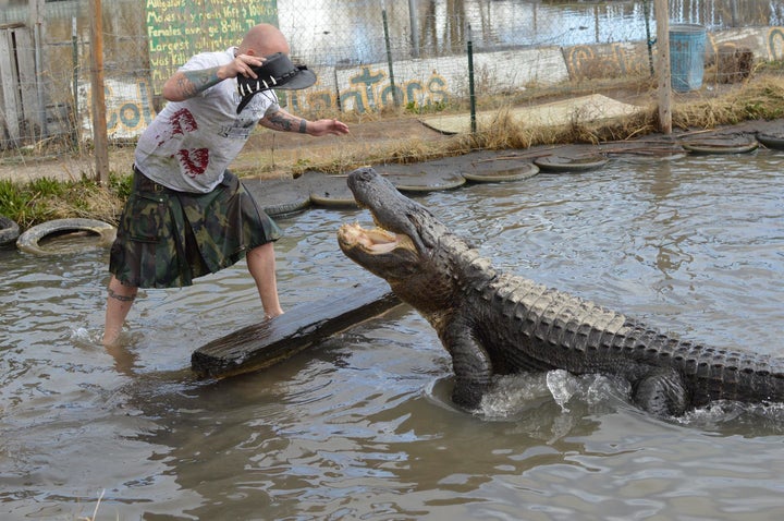 Jason McDonald with Elvis the alligator.